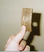 piece of metal used for the bridge